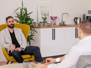 Picture of men in talking therapy