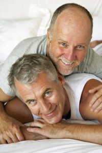 Happy resilient mature gay men