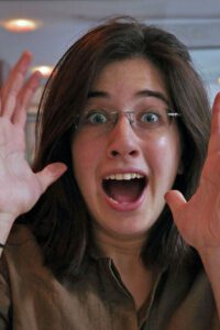 woman face during irrational fear, phobic episode