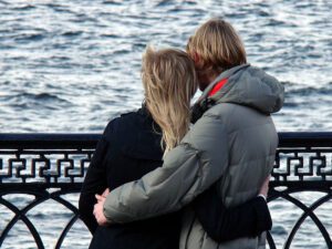 couple in a loving hug by the sea