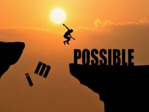 motivated person jumping to possible